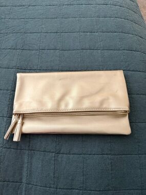 Monat Gold Fold-Over Clutch with Tassel Detail